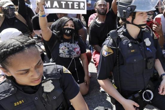 Police and activists at a protest