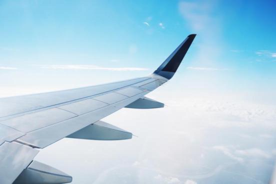 View out of an airplane window over the wing
