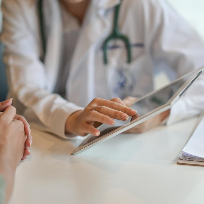 A doctor talking to a patient