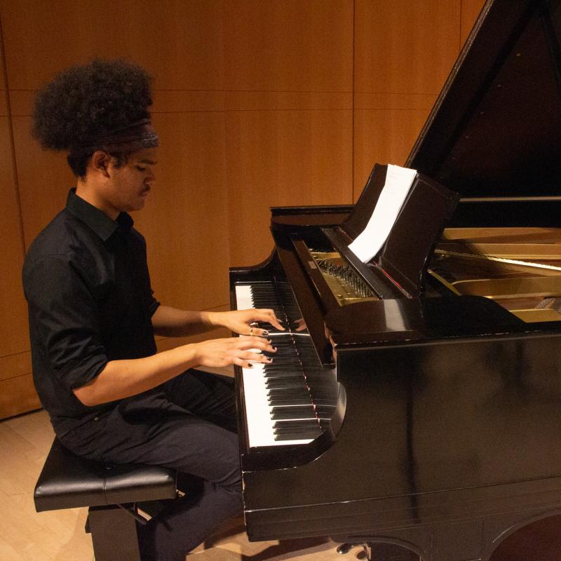 Pianist playing at piano