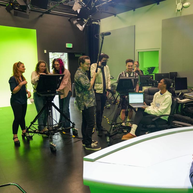 Production crew gathered around cameras
